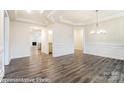 Spacious living room featuring hard surface floors, neutral walls, and open layout at 8716 Acadia Pkwy # 596, Sherrills Ford, NC 28673