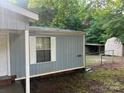 Fenced backyard with two storage sheds for extra storage at 13080 Philadelphia Church Rd, Oakboro, NC 28129