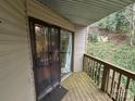 Balcony view featuring a sliding glass door and railings, providing a private outdoor space at 1420 11Th Street Nw Dr # 25, Hickory, NC 28601