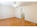 Bright bedroom with hardwood floors, a ceiling fan and neutral paint at 1461 Flintwood Dr, Rock Hill, SC 29732
