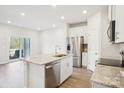 Modern kitchen with granite countertops and stainless steel appliances at 1758 Braemar Village Dr, Monroe, NC 28110