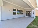 Spacious covered patio perfect for outdoor entertaining with sliding door access at 2204 Camber Dr # Cwo0076, Gastonia, NC 28054