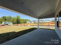 View from the covered patio of the construction in the surrounding neighborhood at 2204 Camber Dr # Cwo0076, Gastonia, NC 28054