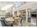 Open concept home featuring dining area, kitchen with stainless appliances, and living room with comfortable seating at 317 Commodore Loop, Mooresville, NC 28117