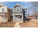 Attractive two-story home featuring a cozy porch and neat landscaping at 330 Malvern Sw Ave # A, Concord, NC 28025