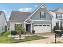 Inviting home showcasing a well-kept lawn and attractive landscaping at 50143 Robins Nest Ln, Lancaster, SC 29720