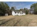Spacious yard featuring a detached shed and a well-maintained one-story house with a garage at 4175 Barnell Ln, Maiden, NC 28650