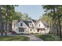 Charming modern farmhouse-style home with white siding, a gray roof, and a well-manicured lawn at 324 Bridgewater Ln, Mooresville, NC 28117
