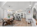 Bright kitchen with white cabinets, stainless steel appliances and a central island with barstool seating at , Hickory, NC 28601