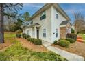 Charming townhouse featuring well-maintained landscaping and a private entrance at 11426 Savannah Creek Dr, Charlotte, NC 28273