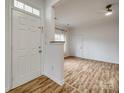 Bright and airy living room featuring stylish floors, fresh paint, and ample natural light at 11426 Savannah Creek Dr, Charlotte, NC 28273