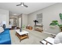 Bright living room with stylish furniture, neutral colors, and a comfortable layout for entertaining guests at 137 Woodbridge Cir, Mount Holly, NC 28120