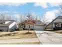 Charming home with a spacious driveway and well-manicured lawn, creating a welcoming curb appeal at 14827 Batteliere Dr, Charlotte, NC 28278
