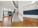 Bright open foyer with staircase and hardwood floors at 11000 King George Ln, Waxhaw, NC 28173