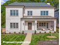 A grand two-story brick home showcases its beautiful front yard and covered front porch at 4008 Nettie Ct # 3, Charlotte, NC 28211
