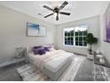 Cozy bedroom featuring a ceiling fan, large window, and neutral color scheme at 1555 Andora Dr, Rock Hill, SC 29732