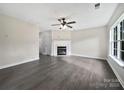Spacious living room with ample natural light, ceiling fan, and open floor plan at 1555 Andora Dr, Rock Hill, SC 29732