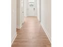 Bright hallway with hardwood floors leads to the entrance of the home at 237 Miramar Dr, York, SC 29745
