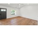 Bright bedroom features hardwood floors, natural light and recessed lighting at 2429 Ellen Ave, Charlotte, NC 28208