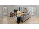 Bright and airy living room featuring modern furnishings and natural light at 2512 Cranbrook Ln # 1, Charlotte, NC 28207