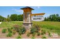 Westport community signage with manicured landscaping on a bright and sunny day at 283 Miramar Dr, York, SC 29745