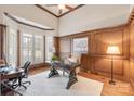 Spacious office with custom wood paneling and bright windows at 9901 Strike The Gold Ln, Waxhaw, NC 28173