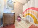 Bathroom featuring a single vanity, patterned shower curtain, and tile flooring at 1056 Latham Ct # B104, Rock Hill, SC 29732