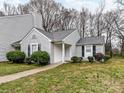 Charming home featuring a well-maintained lawn, sidewalk, and beautiful landscaping at 1544 Hunt Club Ct, Rock Hill, SC 29732