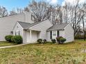 Charming home featuring a well-maintained lawn, sidewalk, and beautiful landscaping at 1544 Hunt Club Ct, Rock Hill, SC 29732