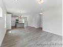 Open layout featuring a large island and barstool seating at 156 Tangle River Dr # 35, Statesville, NC 28677