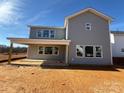 New construction home with a covered back porch and plenty of large windows at 2211 Camber Dr # Cwo0103, Gastonia, NC 28054