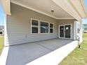 Covered patio with concrete flooring and views of the neighborhood at 2211 Camber Dr # Cwo0103, Gastonia, NC 28054