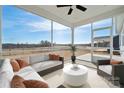 Inviting screened-in porch with comfortable seating and a view of the lush surrounding landscape at 3225 Whispering Creek Dr, Indian Trail, NC 28079