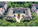 An aerial view of the property surrounded by trees at 8925 Rosalyn Glen Rd, Cornelius, NC 28031