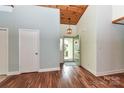Bright entryway with an open door to the outside at 10213 Conistan Pl, Cornelius, NC 28031