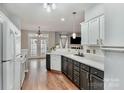 Spacious kitchen with stainless steel appliances and light gray cabinets at 618 Bayou Cir, Clover, SC 29710