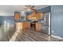 Spacious kitchen with stainless steel appliances and modern flooring at 166 Sonja Dr, Statesville, NC 28677