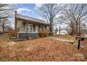 Charming single-story home featuring a well-maintained yard and classic architectural details at 1759 Smith Ave, Gastonia, NC 28052