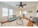 Bright living room featuring hardwood floors, stylish furniture, and ample natural light at 930 Beverly Dr, Rock Hill, SC 29730
