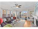 Bright living room with a comfortable sofa, balcony access, and modern decor at 1101 E Morehead St, Charlotte, NC 28204