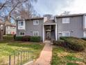 Charming condo exterior with well-maintained landscaping and inviting entrance, perfect for comfortable living at 2900 Heathstead Pl # A, Charlotte, NC 28210