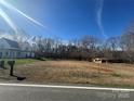 Wide view of the property showcasing a cleared homesite ready for construction at 311 Meadow Creek Church Rd # 2, Locust, NC 28097