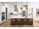 Modern kitchen boasts a large island with barstool seating and stainless steel appliances at 3468 Aleppo Ave # 366, Indian Land, SC 29707