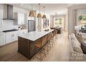 Open kitchen concept with a large island, stainless steel appliances, and an adjacent dining area at 3468 Aleppo Ave # 366, Indian Land, SC 29707