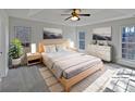 Bright primary bedroom features a tray ceiling, neutral walls, and great natural light at 414 Fox Fire Run, Gastonia, NC 28052