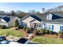 A home with meticulous landscaping, sidewalk leading to front door and parking at 450 Guiness Pl, Rock Hill, SC 29730
