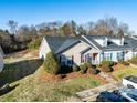 Cozy home featuring manicured lawn and sidewalk leading up to the front at 450 Guiness Pl, Rock Hill, SC 29730