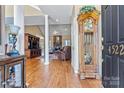 Grand foyer with hardwood floors, high ceilings, and classic grandfather clock at 4522 Long Cove Dr, Denver, NC 28037
