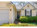 Charming single-Gathering home featuring a well-manicured lawn and inviting front entrance at 5120 Silabert Ave, Charlotte, NC 28205