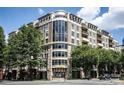 Beautiful exterior of a multi-story building with architectural details at 718 W Trade St # 302, Charlotte, NC 28202